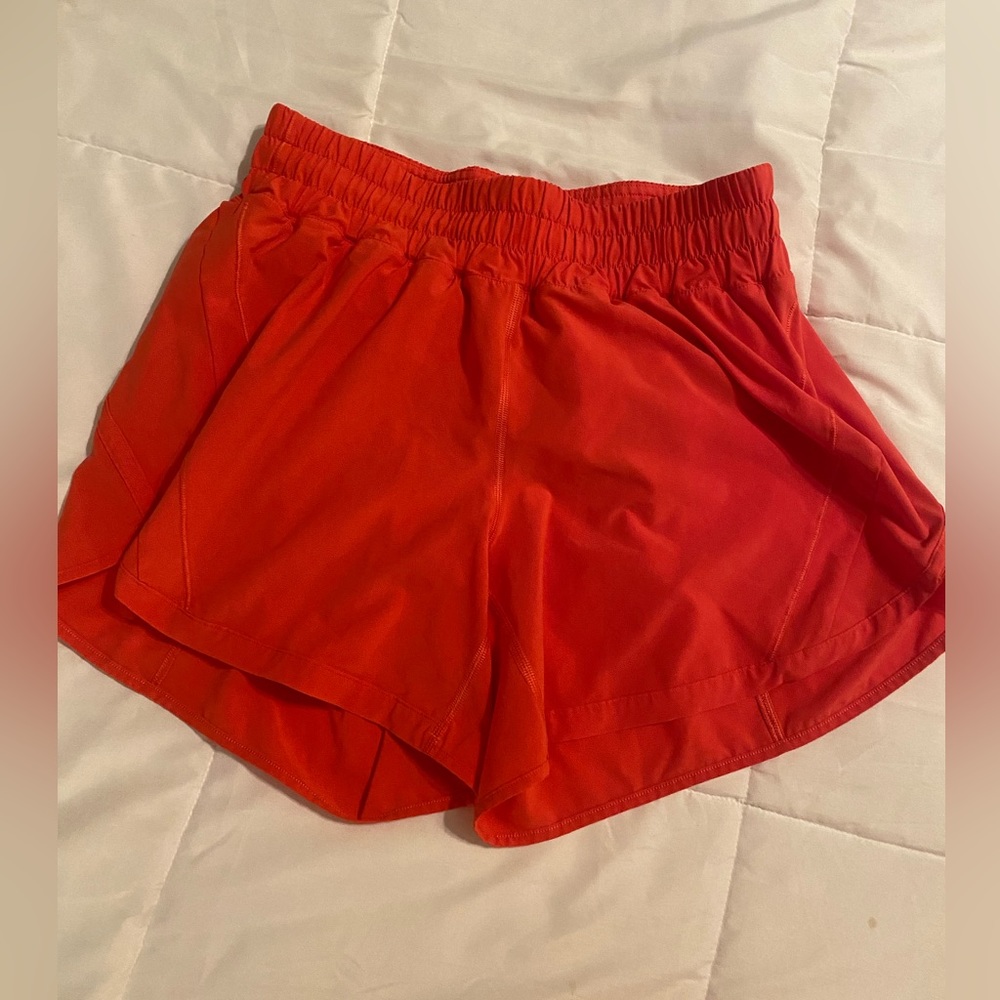 Lululemon red track that 5” shorts. Size 8. Great condition.
